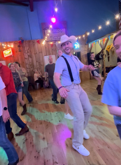 Dan Waterman line dancing at a country venue